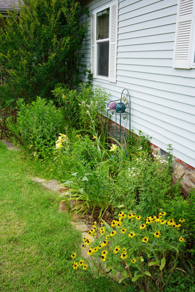 flowerbed next to house